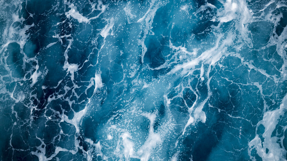 Blue deep sea foaming
